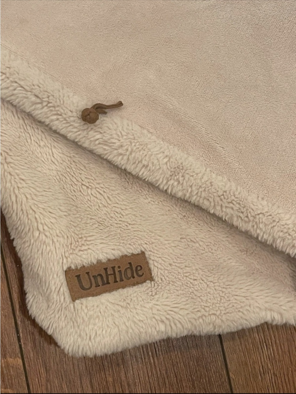 UnHide blanket in cream 60 by 80
